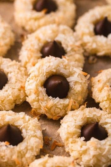 Coconut flaked cookies with a chocolate kiss in the middle.