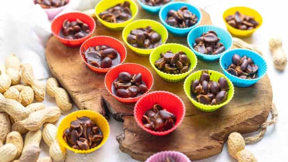 Dark chocolate–coated peanut clusters.