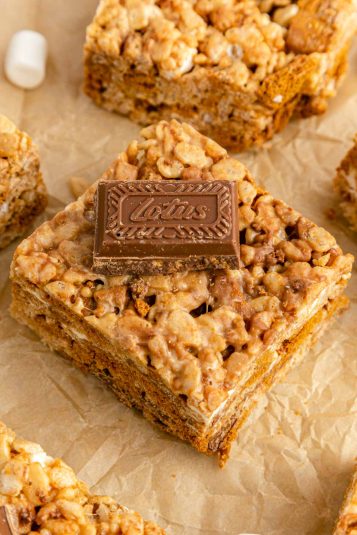 Biscoff rice krispie treats on a piece of parchment paper.