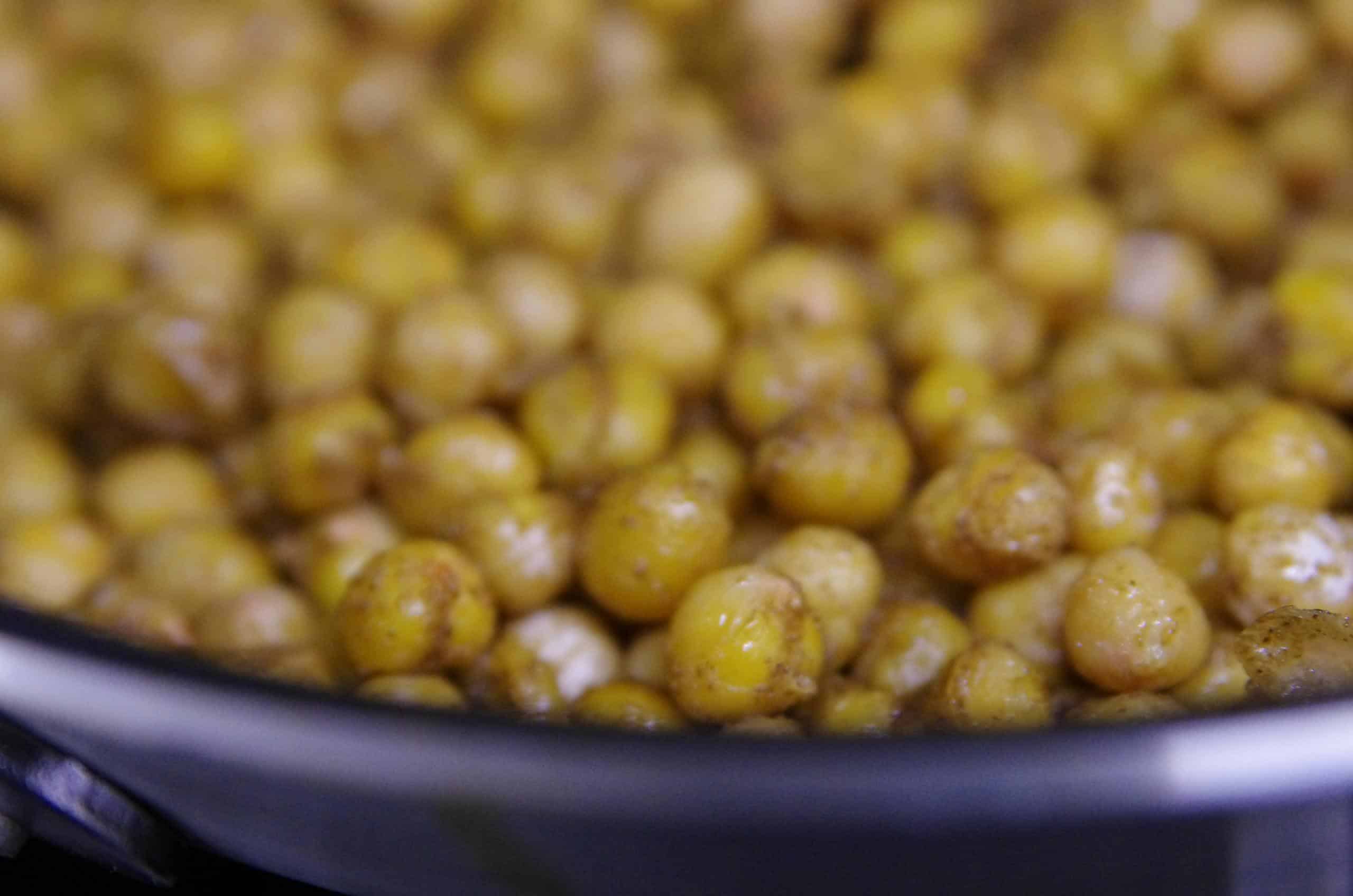 Close-up of seasoned roasted chickpeas, a healthy and nutritious snack.