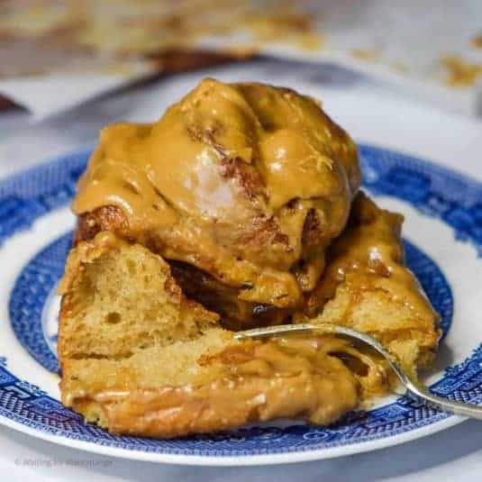 Coconut caramel cinnamon rolls with dulce de leche glaze.
