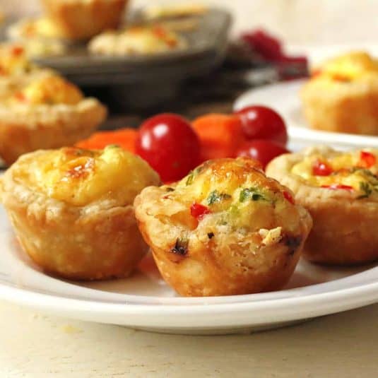 An overhead view of an iced Mountain Dew bundt cake on a yellow plate.