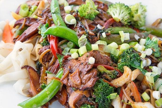 Stir Fried Pork Ho Fun on a white platter.