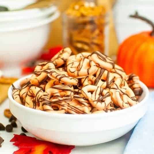 Pumpkin Spice Chocolate Pretzels, a delicious snack recipe featuring candy coated pretzels with pumpkin spice flavoring.