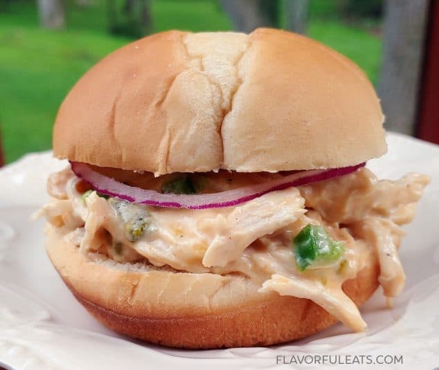 Slow Cooker Jalapeno Popper Chicken on a bun for sandwiches.