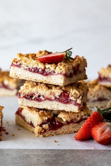A stack of Coconut Strawberry Crumble Bars.
