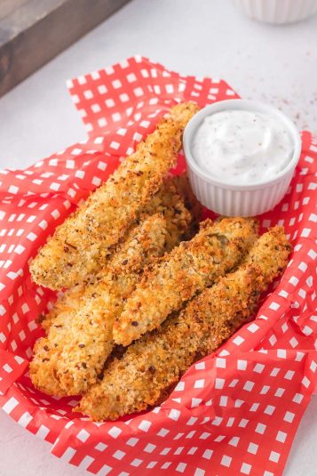 Crispy Air Fryer Pickles with a creamy ranch dip.