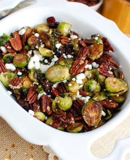 Brussels Sprouts with Cranberries in white bowl.