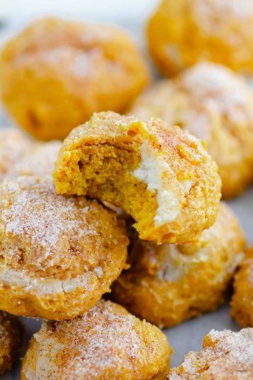 Cookies on a wire rack with white parchment paper.