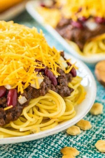 Slow cooker country style ribs on a tray on top of mashed potatoes with corn.