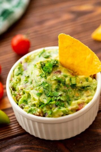 A flavor packed mexican dip consisting of avocados, garlic, onion, lime, and cilantro.