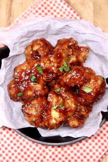 Overhead view of bowl of bbq boneless wings.