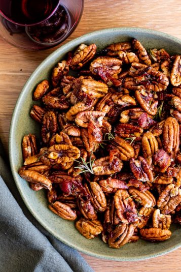 A bowl of Maple Bacon Roasted Pecans.