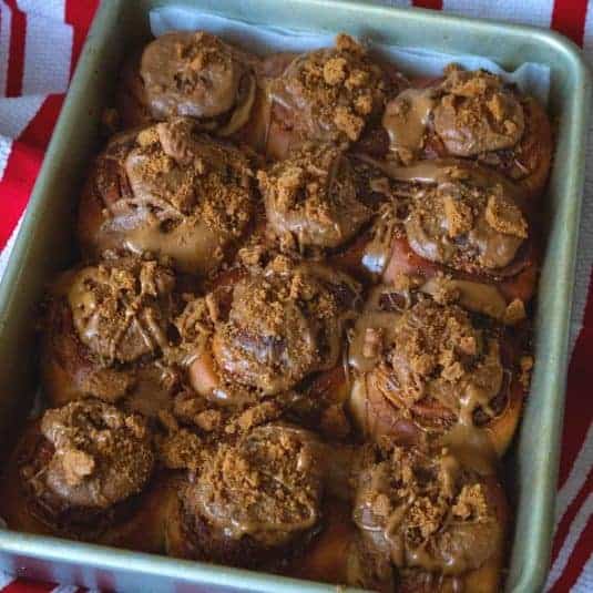 A rectangular pan with lotus spread rolls.