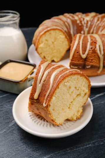 Brown sugar bundt cake with caramel drizzle on a plate.