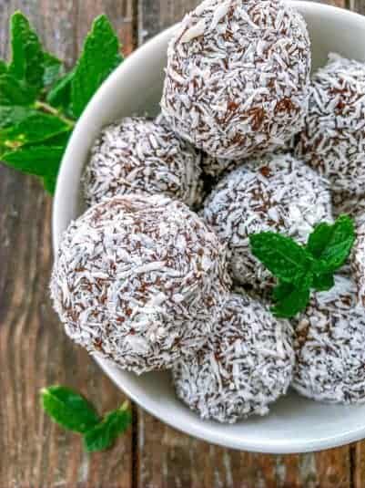 Chocolate Mint Bliss Balls in a white bowl.