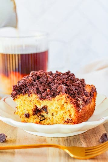A slice of coffee cake recipe on a green plate.
