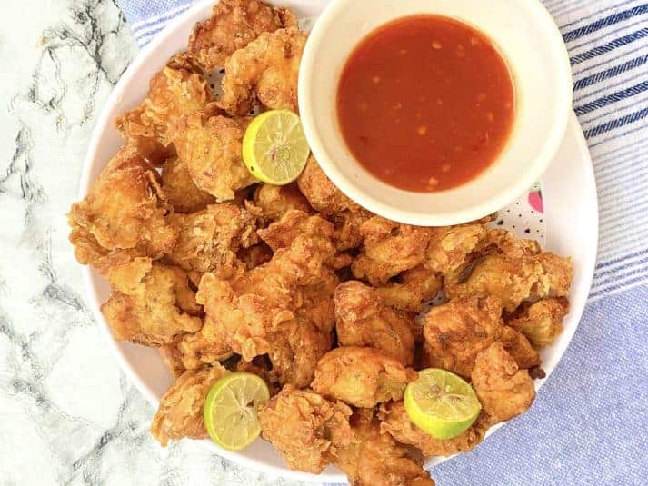 A plate with baked roll ups on them ready to serve for any occasion.