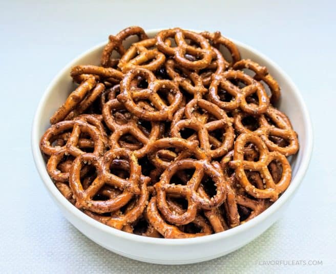 Spicy Seasoned Pretzels in a white serving bowl.