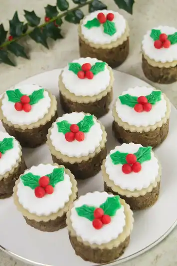 Mini Christmas Cakes on a white plate.