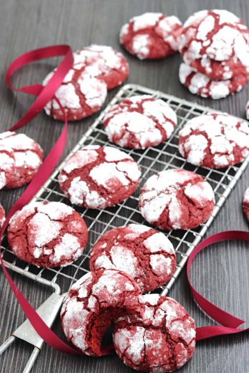 Red velvet stuffed cookies on a white and red towel.