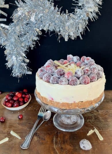 This no-bake mascarpone cheesecake is sure to impress your guests during the festive season. Featuring a spiced gingerbread crust and a decadent white chocolate filling, it's crowned with homemade sugared cranberries for a touch of holiday magic. It's a perfect dessert to add a sophisticated yet easy-to-make treat to your holiday spread.