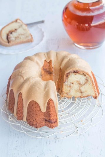 Whole caramel Bundt cake with cinnamon swirl and caramel icing.