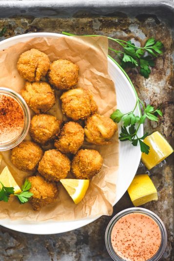 Crispy crab balls on a plate.