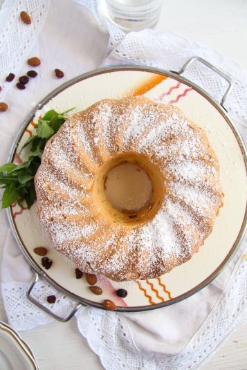 Overhead view of egg white cake with almonds.