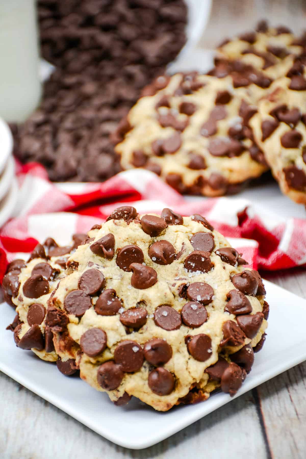 a copycat Gideon's chocolate chip cookie topped with more chocolate chips and flaky sea salt.