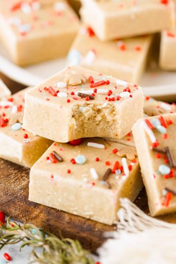 A closeup shot of Gingerbread Fudge on a wooden board.