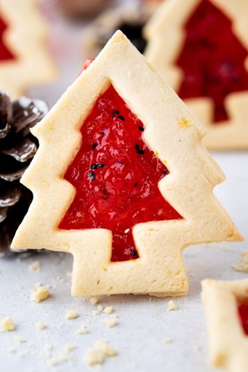 Linzer cookie on a white board with a cone.