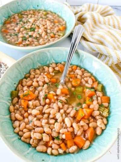 Two green bowls of no soak instant pot bean soup.