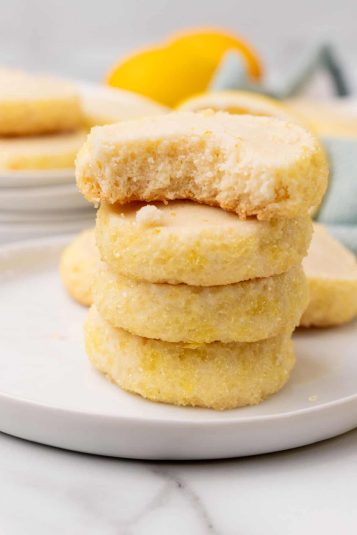 Lemon cookies on a wire rack.