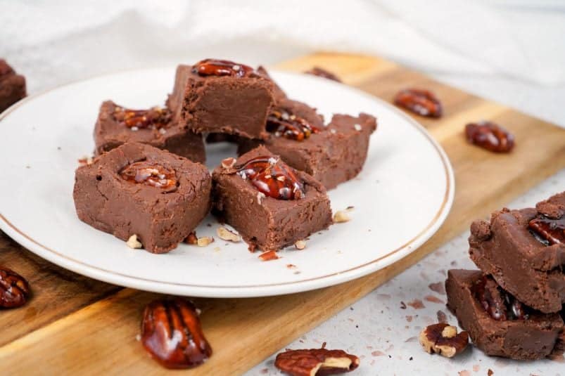 Candied Pecan Chocolate Fudge on a white plate.