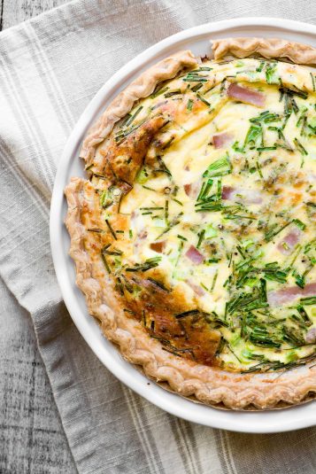 Overhead shot of Eggs Benedict Quiche with Hollandaise Sauce.