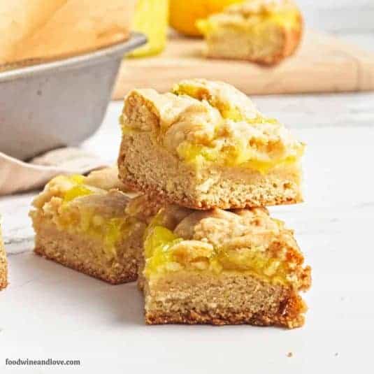 Vegan Lemon Curd Cookie Bars, a delicious dairy free dessert recipe featuring a soft cookie crust topped with tangy lemon curd.