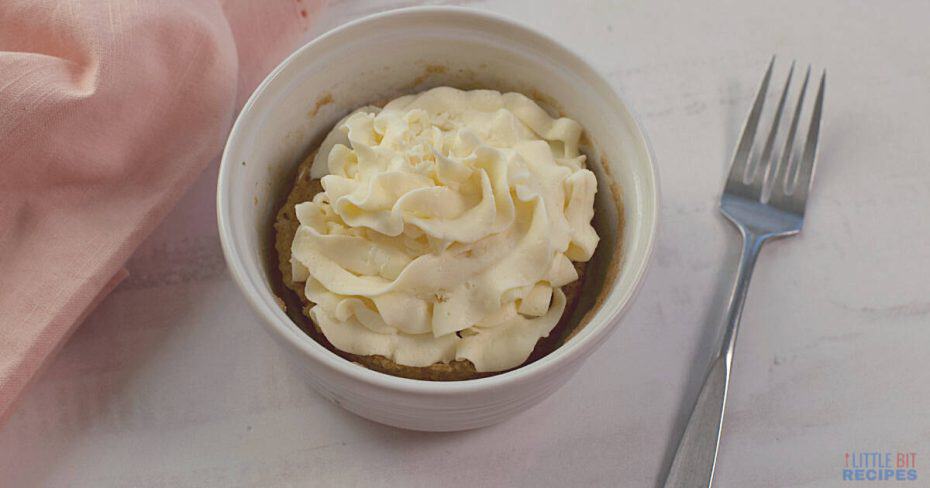 Slices of baked carne asada on small wood cutting board.