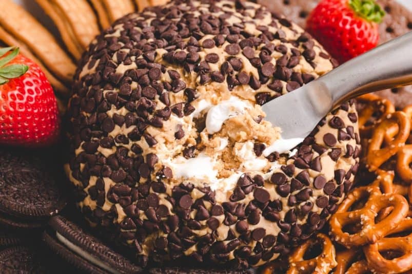 Closeup of fluffernutter dip with a knife in it.