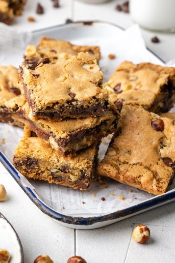 A stack of nutella bars on a white metal tray.