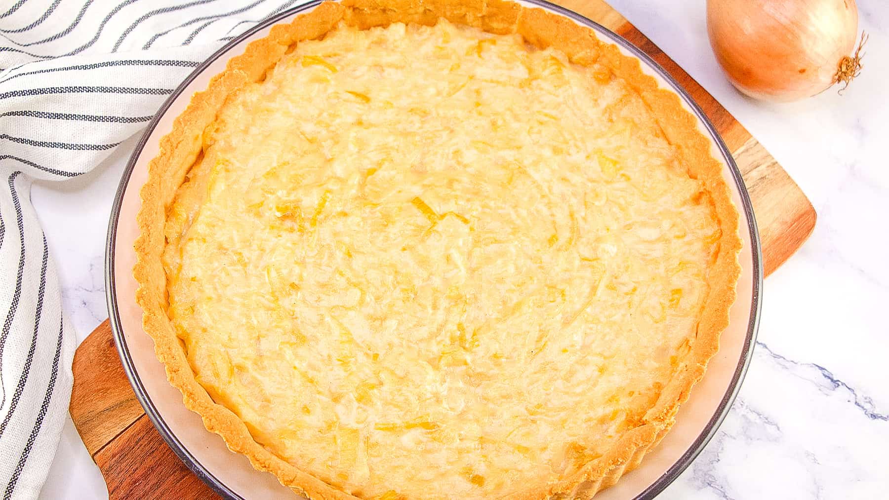 a whole onion tart in a pastry shell. 