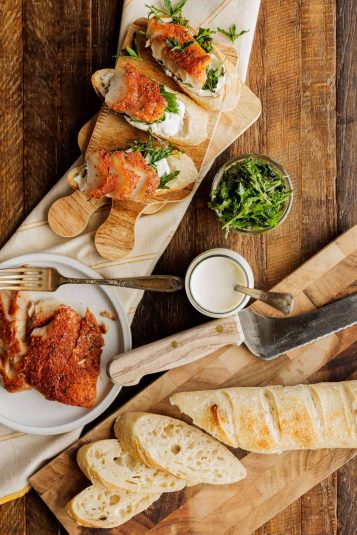 Smoked fish crostini with sliced baguette.