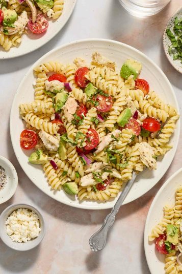 1. Fresh Italian pasta salad with cherry tomatoes, chicken, and avocado.