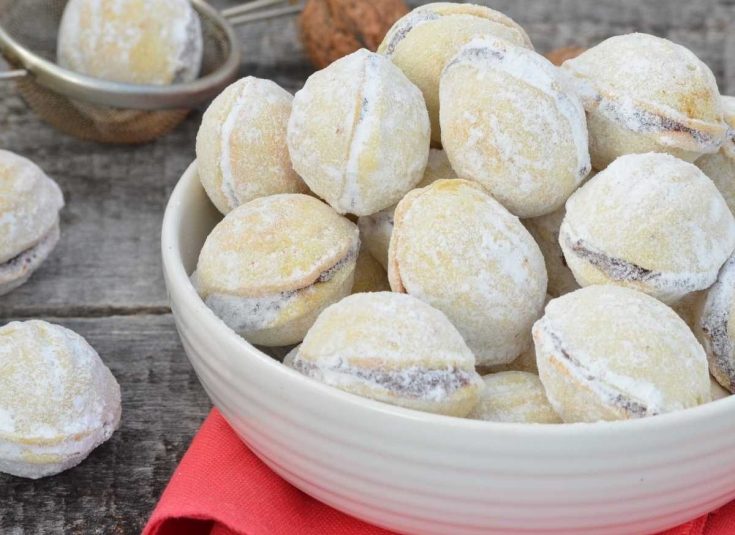 Walnut Cookies with Cocoa Cream in a white bowl.
