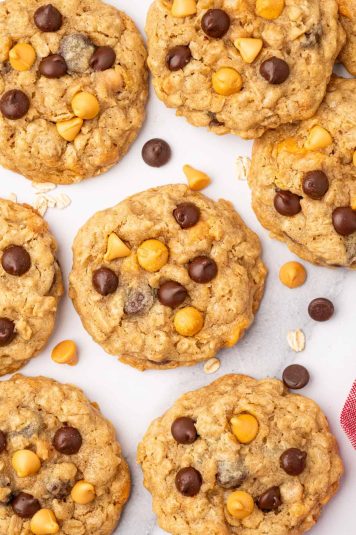Butterscotch chocolate chip oatmeal cookies arranged in a marble table.