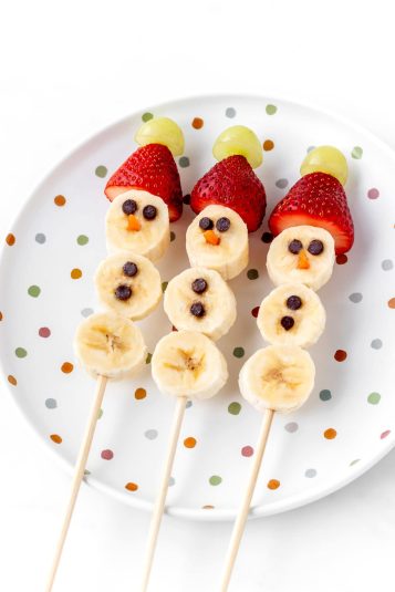 Banana snowmen on a plate.
