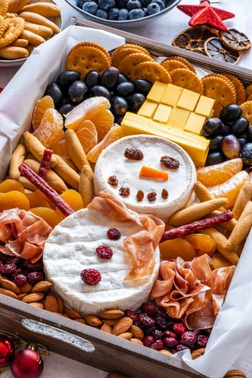 Snowman cheese board for winter catherings.