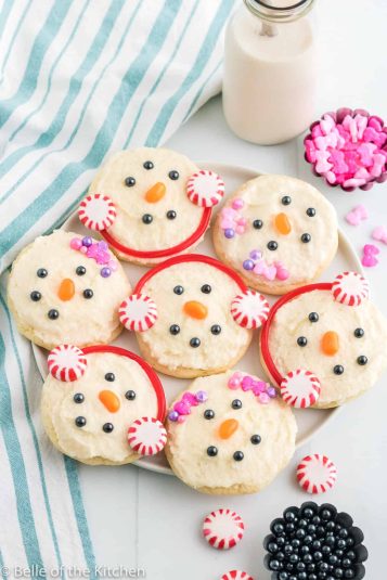 Snowman cookies on a plate.