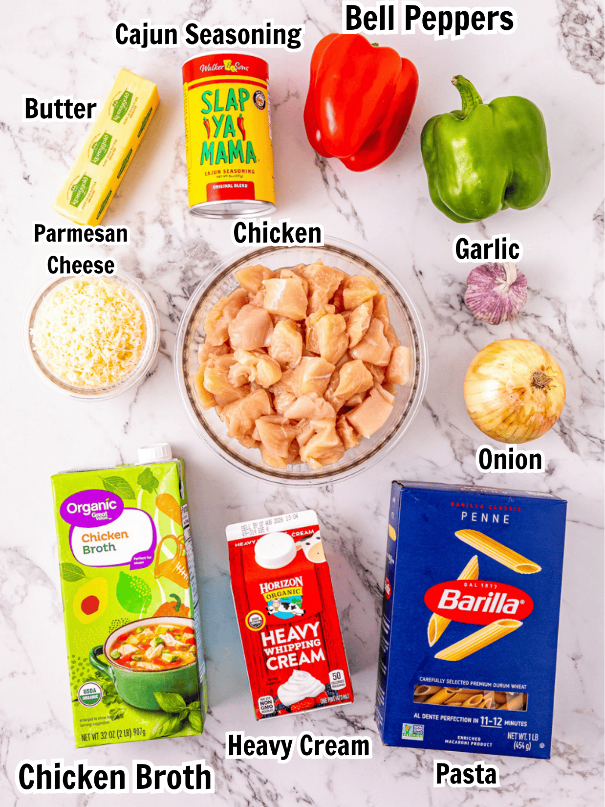 ingredients including chicken, Cajun seasoning, bell peppers, penne pasta, heavy cream, chicken broth, and cheese.