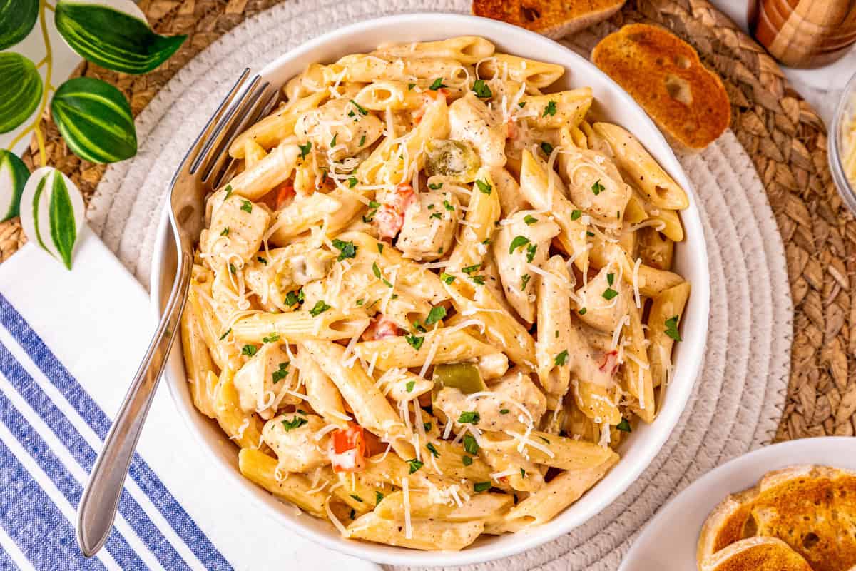 a bowl of chicken Cajun pasta made in the slow cooker.